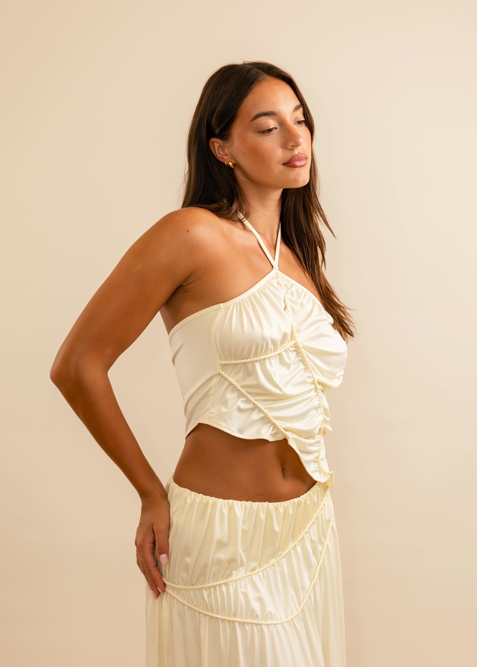 cream set with asymmetrical skirt and top 