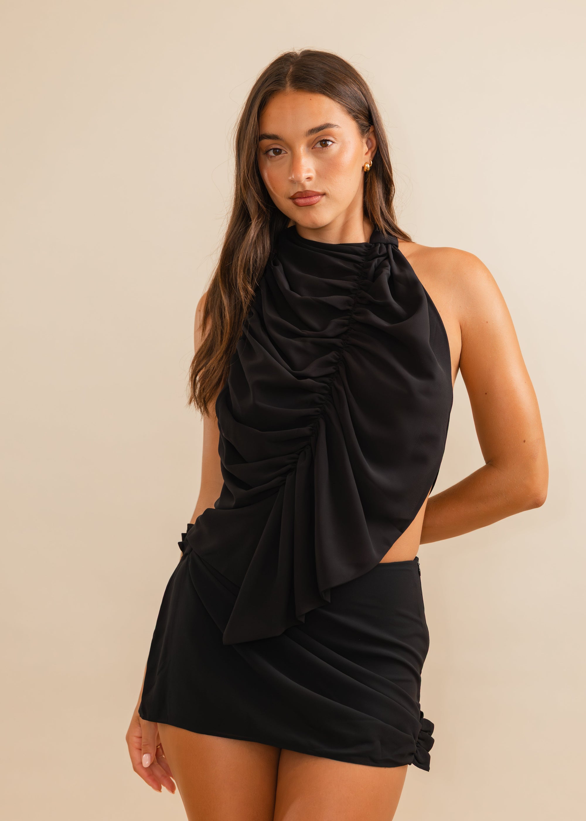 draped top black with matching mini skirt 