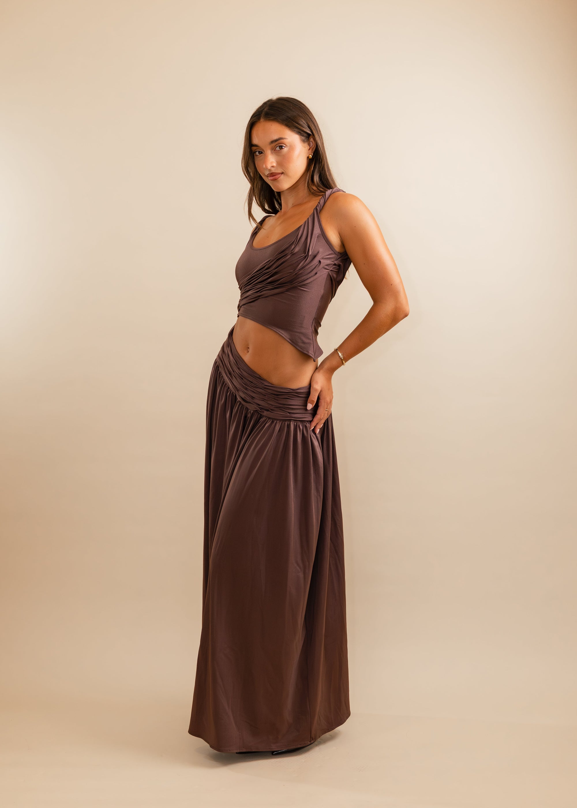 plum top and skirt draped 