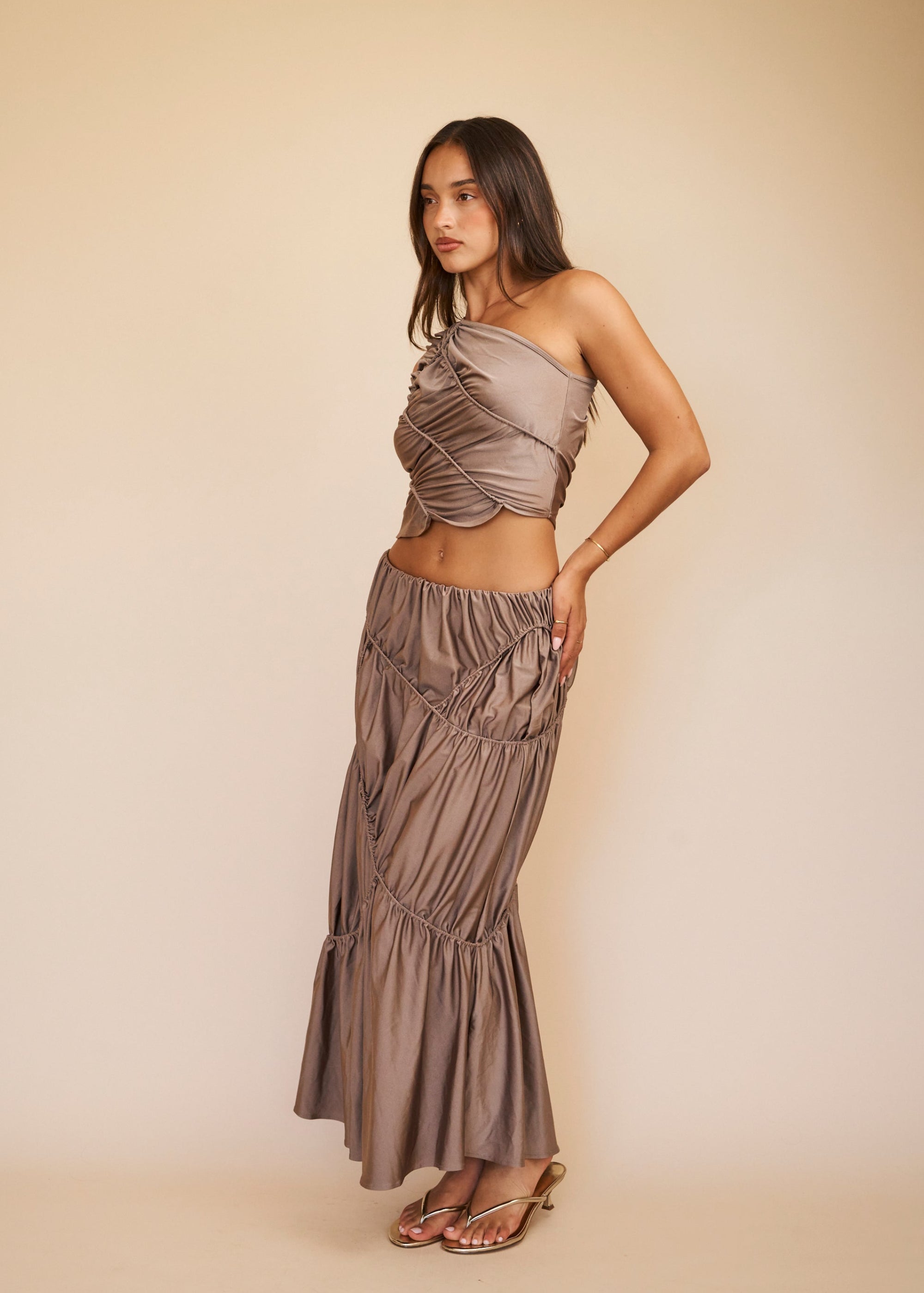 Mocha two piece set with one shoulder ruched top and tiered maxi skirt