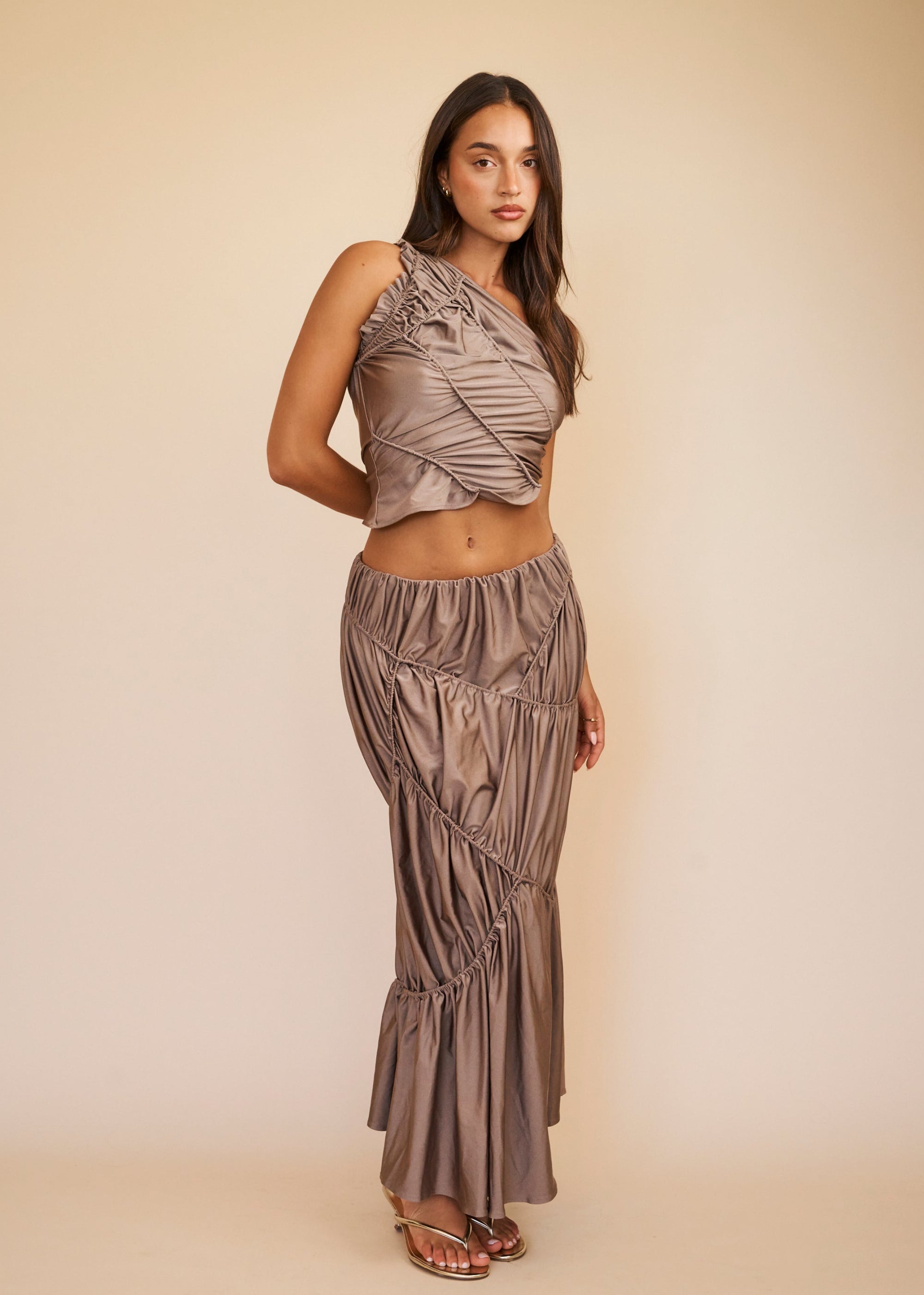 Mocha two piece set with one shoulder ruched top and tiered maxi skirt