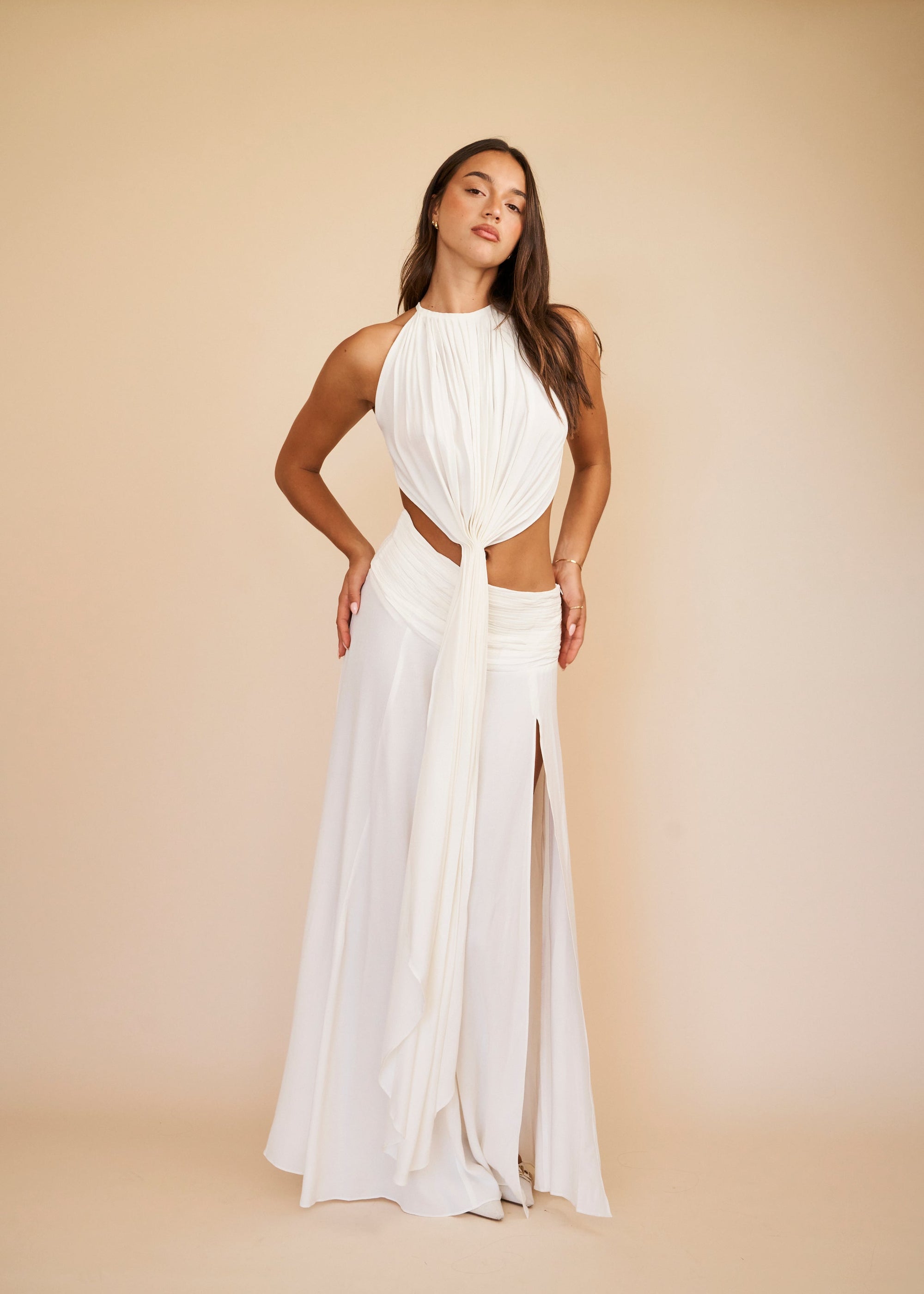 White matching set with halter neckline and side split skirt