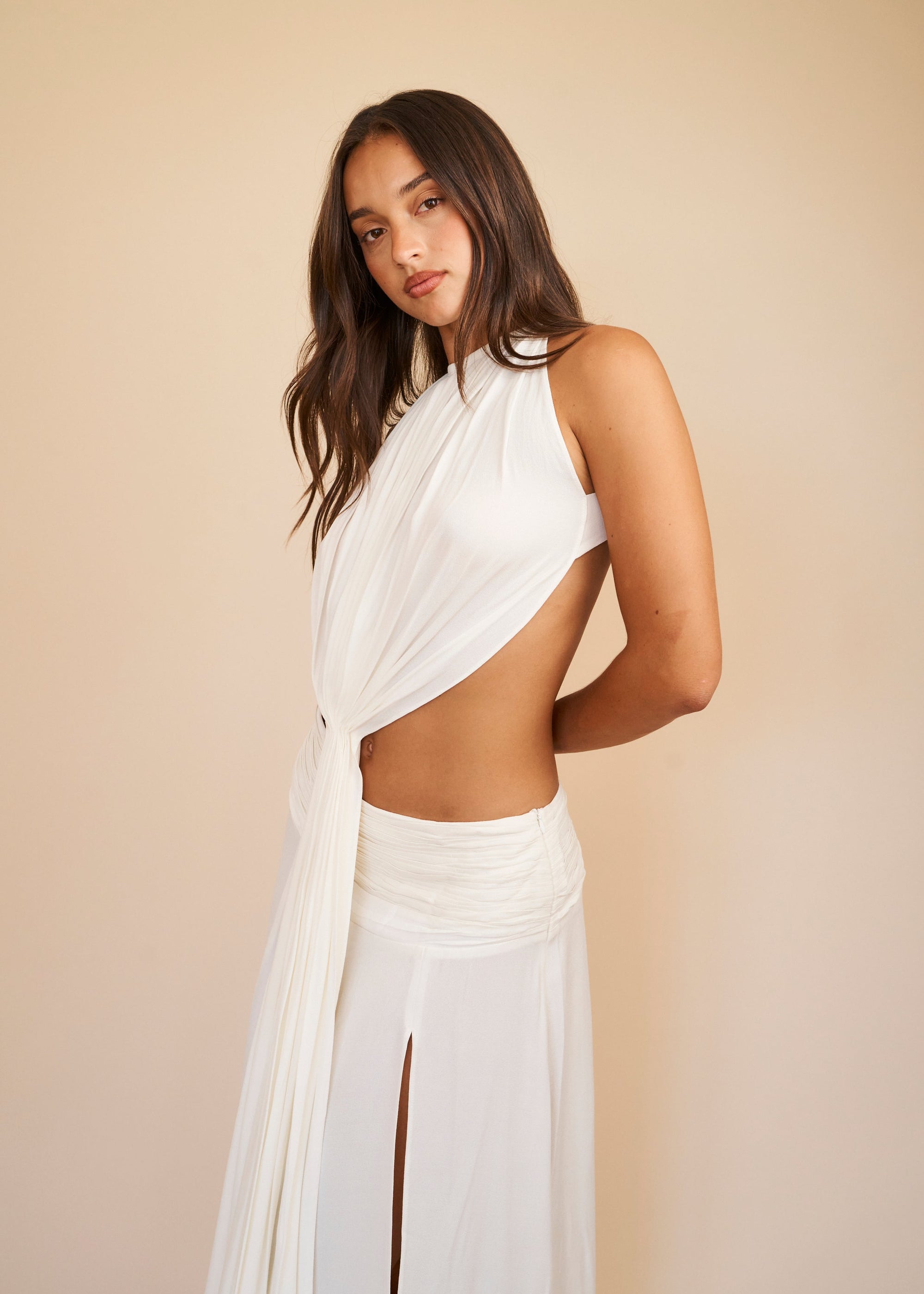 White draped halter top with sculptural pleats 